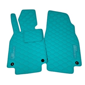 May include: Two-piece set of turquoise car floor mats. The mats have a textured, honeycomb pattern and are designed to fit the driver and passenger sides. Each mat has a black circular fastener and a raised edge.
