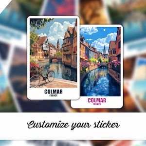 May include: Two stickers featuring picturesque scenes of Colmar, France, with a canal, buildings, and a bicycle. The stickers have the text "COLMAR FRANCE" at the bottom. The words "3 sizes" are at the top left.