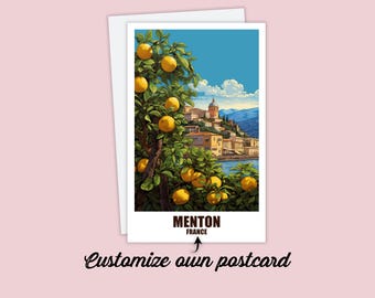 May include: A postcard featuring a colorful illustration of a town in Menton, France, with a citrus tree in the foreground. The text "MENTON FRANCE" is printed at the bottom of the postcard.