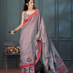 Elegant Handloom Linen Saree Collection Featuring Artistic Thread Weaving, Contrast Borders, Floral Buttas, Soft Drape & Unstitched Blouse