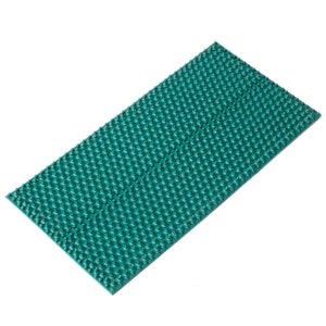 May include: A green acupressure mat with a grid of small, rounded spikes. The mat is designed to stimulate the feet and improve circulation.