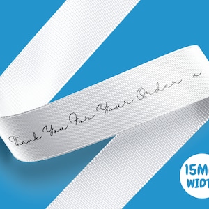 May include: White satin ribbon with the text "Thank You For Your Order x" printed in black ink. The ribbon is 15mm wide.