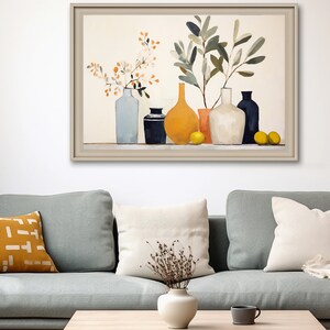 May include: A framed painting of a still life with a variety of vases and lemons. The vases are in shades of blue, white, and yellow, and the lemons are yellow. The painting is set against a white background.