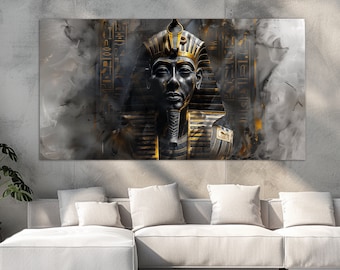 May include: A black and gold pharaoh bust with hieroglyphics in the background. The bust is set against a gray and white background.