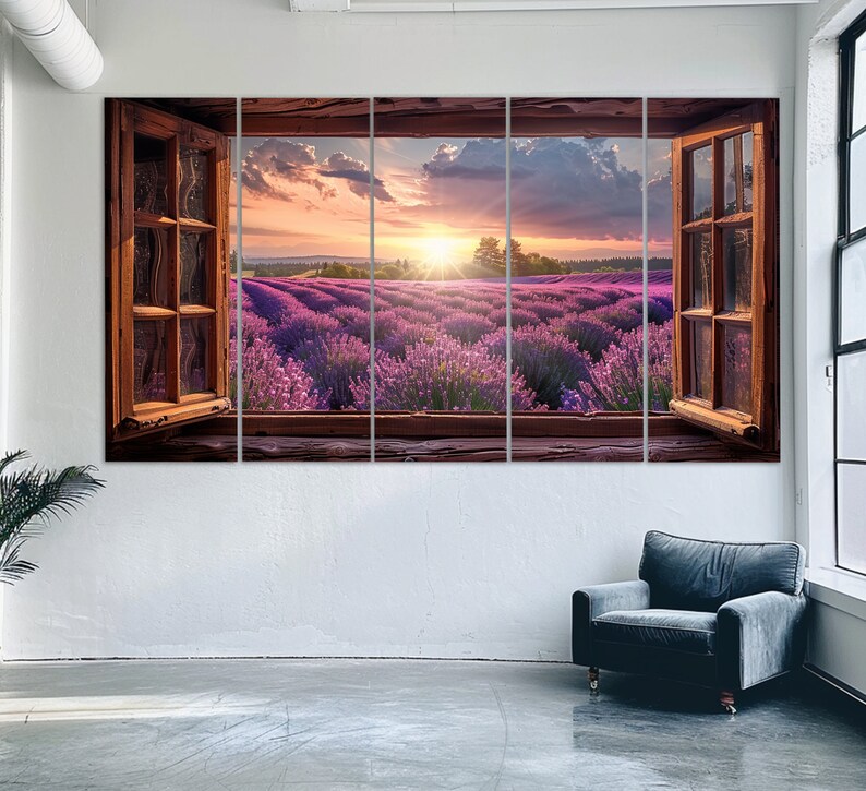 May include: A multi-panel canvas print featuring a view of a lavender field through an open window. The field is bathed in the warm light of a setting sun, creating a peaceful and serene scene.