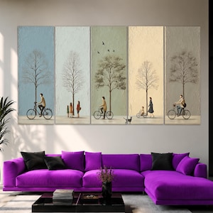 Könnte beinhalten: Ein fünfteiliges Wandbild-Set mit einer durchgehenden Landschaft auf strukturierten Hintergründen in Blau, Hellgrün und Beige. Die Paneele zeigen stilisierte Bäume, Menschen auf Fahrrädern, stehende Personen, ein Kind auf einem Rad und eine Katze.