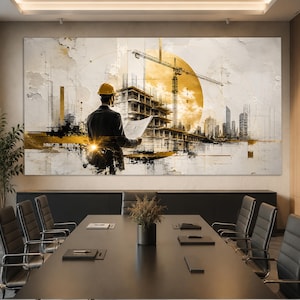 Peut inclure: Une grande impression murale rectangulaire représentant un chantier de construction avec une personne portant un casque jaune et tenant des plans. L'œuvre utilise une palette de blanc, noir et or, illustrant une grue, un bâtiment et une ville.