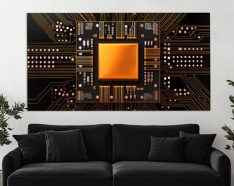 Könnte beinhalten: Nahaufnahme einer Leiterplatte mit einem goldfarbenen Prozessorchip in der Mitte. Die Platine ist schwarz mit orangefarbenen Linien und Punkten.