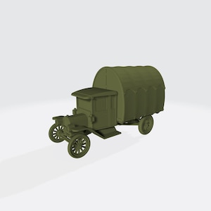 Può includere: Un modello di camion vintage verde con un'area di carico coperta. Il camion ha ruote a raggi e una piccola cabina. L'area di carico è arcuata e ha una trama a coste.