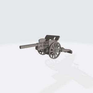 May include: A grey model cannon with a long barrel and spoked wheels. The cannon is mounted on a carriage, resembling a miniature historical artillery piece. The design includes detailed features, typical of a model.