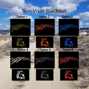 May include: Black sun visor blackout options with the word "RAPTOR" in various colors, including yellow, orange, and blue. Each option features a claw mark design and a silhouette of a raptor.