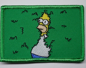 Parche bordado de Homer Simpson: "Desapareciendo entre los arbustos", velcro de 2 x 3 pulgadas