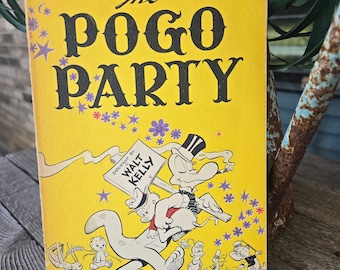 1956 The Pogo Party door Walt Kelly: een verzameling van Kelly's wekelijkse satirische strip. Eerste druk, paperback