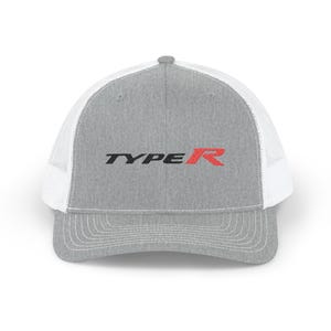 May include: A gray trucker hat with a white mesh back and a curved brim. The front of the hat features the text "TYPE R" in black and red. The hat has a snap closure for an adjustable fit.
