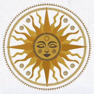 May include: Embroidered sun design in shades of gold and yellow on a white background. The sun has a smiling face with closed eyes and a third eye. The design is circular with a detailed border and decorative elements.