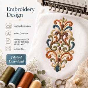 May include: An embroidery design featuring a symmetrical, ornate floral motif in shades of orange, teal, brown, and cream stitched onto white fabric. The image includes text: Embroidery Design, Machine Embroidery, Instant Download, Formats: DST EXP HUS JEF PES SEW VIP VP3 XXX, Multiple Sizes, and Digital Download.