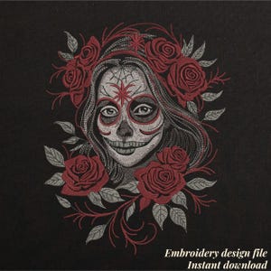 May include: An embroidered design featuring a stylized sugar skull with floral accents. The skull has intricate facial details and is surrounded by red roses and leaves. The text "Embroidery design file Instant download" is at the bottom.