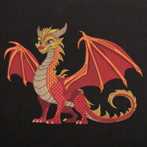 May include: A red and yellow embroidered dragon with wings spread wide. The dragon has a long tail and a friendly face.