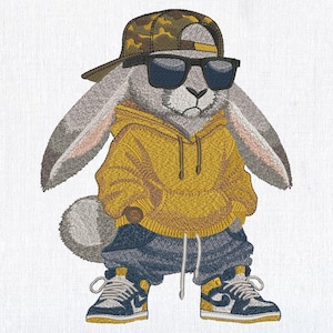 May include: A gray rabbit wearing a yellow hoodie, blue jeans, and black and white sneakers. The rabbit is also wearing a camouflage baseball cap and sunglasses.