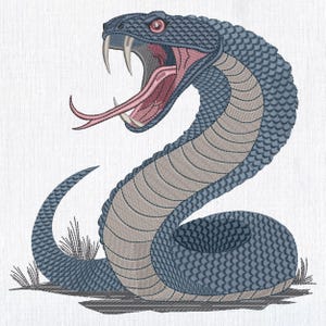 May include: An embroidered design of a snake in a striking pose. The snake is primarily blue with tan and pink accents, featuring an open mouth with fangs and a forked tongue. The design is set against a white background.
