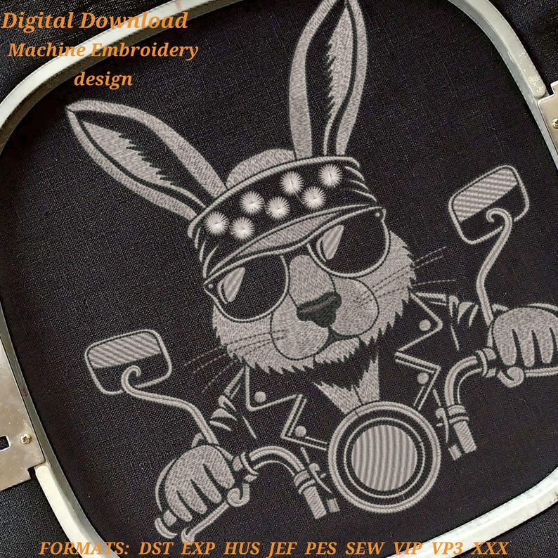 May include: Digital download machine embroidery design featuring a biker rabbit wearing sunglasses and a studded headband, riding a motorcycle. The design is in shades of gray on a black background. The text "Digital Download Machine Embroidery design" is at the top.