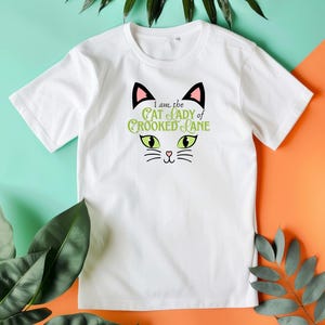 I Am the Cat Lady of Crooked Lane Tshirt, HHN 2025 Tribute Shirt, Universal Studios Halloween Horror Nights Shirt, HHN 34