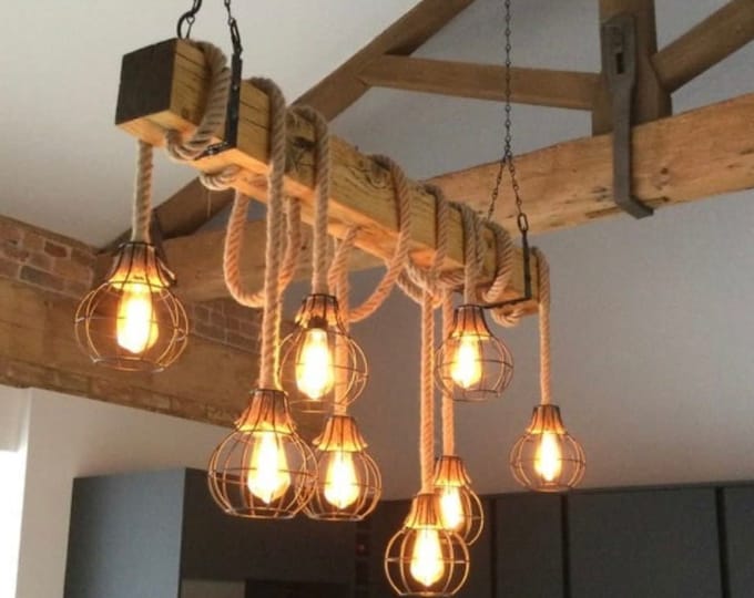 Stunning Rustic solid reclaimed wooden beam ceiling light compete with rope pendants and black cages, suspended by chain and metal hooks