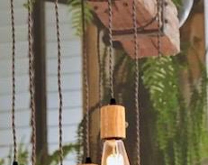 rustic reclaimed beam light with vintage light brown twin cable into wooden bulb holders