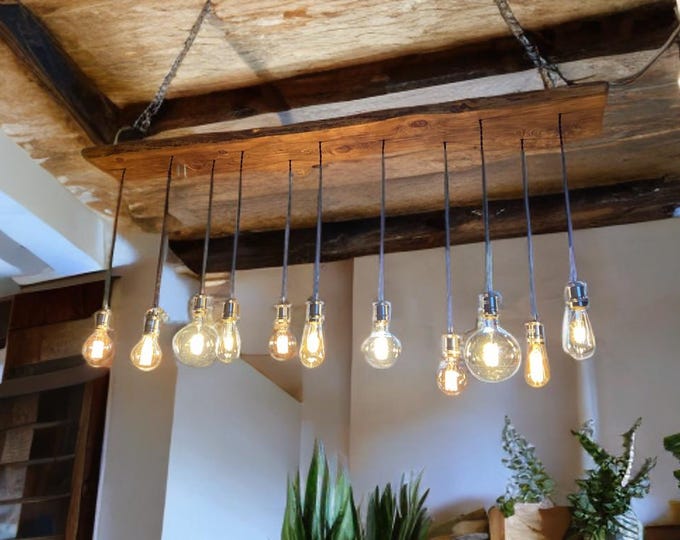 Rustic handmade live edge wooden pendant ceiling light fixture, edison bulb holders and black fittings, waxed in medium oak