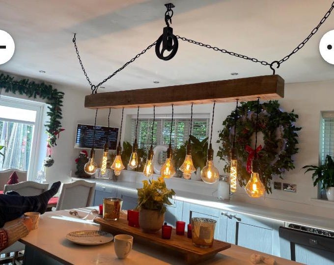 Rustic wooden beam light with vintage pendant Edison bulb holders hung from black chain and pulley, waxed in oak complete with ceiling hooks