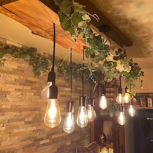 Rustic handmade live edge wooden pendant ceiling light fixture, edison bulb holders and black fittings, waxed in medium oak
