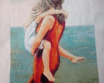 Cross stitch embroidery. Woman with little girl on the beach