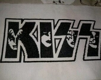 Bordado de punto de cruz. Kiss