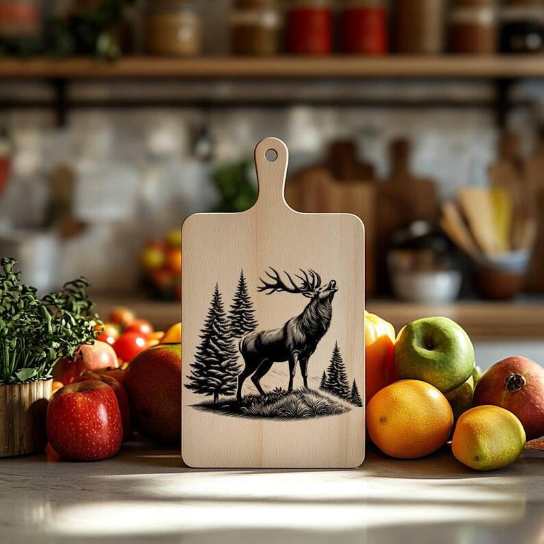 May include: A wooden cutting board with a black and white illustration of a deer in a forest setting. The board has a handle and is perfect for serving or preparing food.