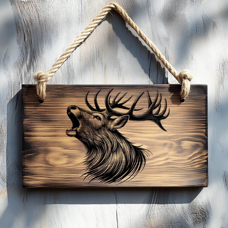 May include: A wooden sign with a black and white illustration of a deer with antlers, the deer is roaring. The sign is hanging from a rope.