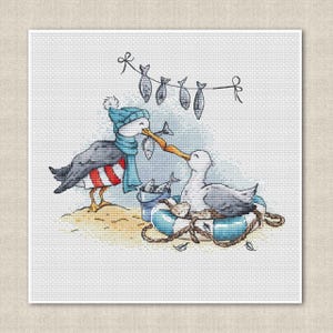 May include: Two cartoon seagulls with blue and red accents, one wearing a blue hat and scarf, sharing a fish on a beach with a life preserver and a bucket of fish hanging from a string of fish.