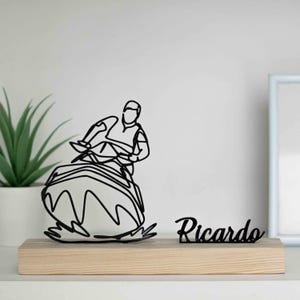 Jet Ski rider statue, perfect as a trophy or nautical decor.