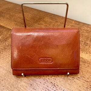 Monedero vintage de los años 70 y 80 en color tostado, hermoso cuero