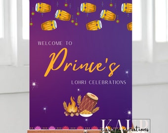 May include: Purple welcome sign with the text "Welcome to Prince's Lohri Celebrations". The sign is decorated with yellow and orange dhol drums, a bonfire, and a bowl of roasted peanuts.