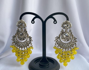 Traditional Gold Jhumki Earrings with Stunning Stone Work.