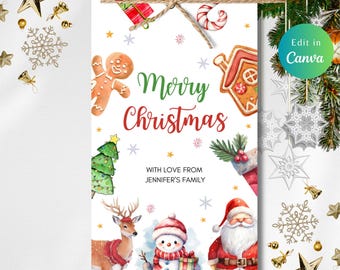 May include: A Christmas-themed gift tag with the words "Merry Christmas" in green and red script. The tag features illustrations of a gingerbread man, Christmas tree, reindeer, snowman, and Santa Claus. Text at the bottom reads "With love from Jennifer's Family."