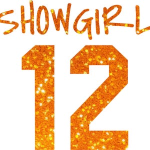 May include: Orange glitter design with the word "SHOWGIRL" above the number "12". The text and numbers are in a bold, stylized font, with a sparkling, textured effect. The background is plain white.