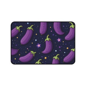 May include: A dark blue background with a repeating pattern of purple eggplants and colorful stars.