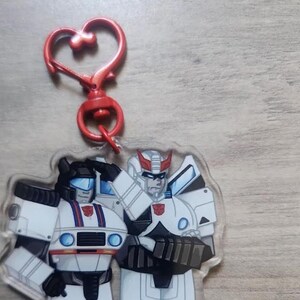 JazzProwl Transformers Fanmade Nyckelring - Anger Management Design (Jazz/Prowl)