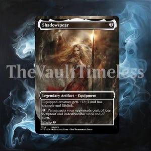 Può includere: Una carta proxy per il gioco Magic: The Gathering, con il nome "Shadowspear". La carta mostra una donna con una lancia, con testo che descrive le sue abilità. "The Vault Timeless" è stampato sulla carta.