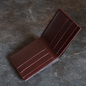 It is made from 100%  full grain vegetable tanned leather. Italian smooth leather "Buttero", proven by time and practice, hand stitching with the use of Japanese linen threads give reliability and confidence that the seam will never come apart.
