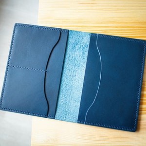 Hand-stitched leather passport wallet made of high quality full grain Italian vegetable tanned leather. 
Minimalist and slim wallet for passports / field notes, cards and boarding pass