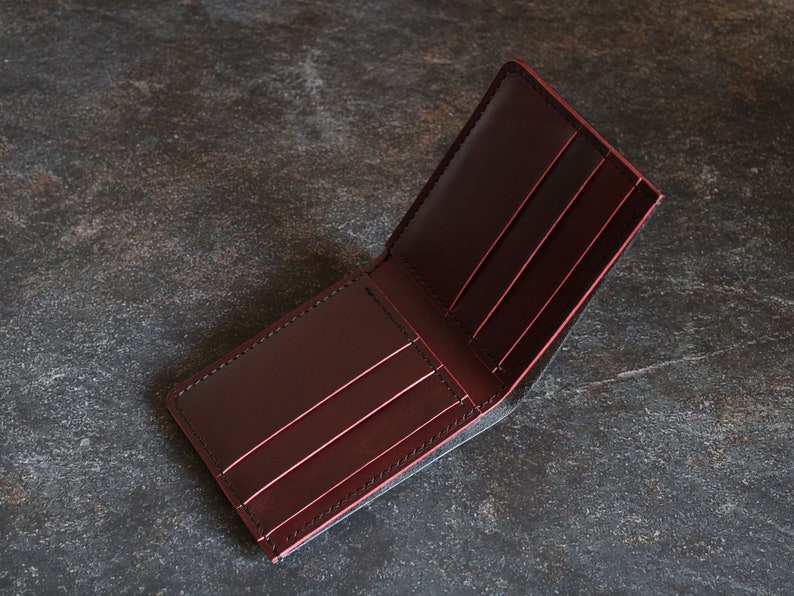 It is made from 100%  full grain vegetable tanned leather. Italian smooth leather "Buttero", proven by time and practice, hand stitching with the use of Japanese linen threads give reliability and confidence that the seam will never come apart.