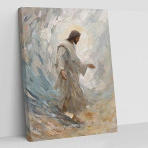 May include: Canvas art print featuring a painting of a figure in white robes with a halo, set against a backdrop of swirling brushstrokes in shades of blue, beige, and white. The text at the bottom reads, "May peace, hope, and joy always dwell within these walls."