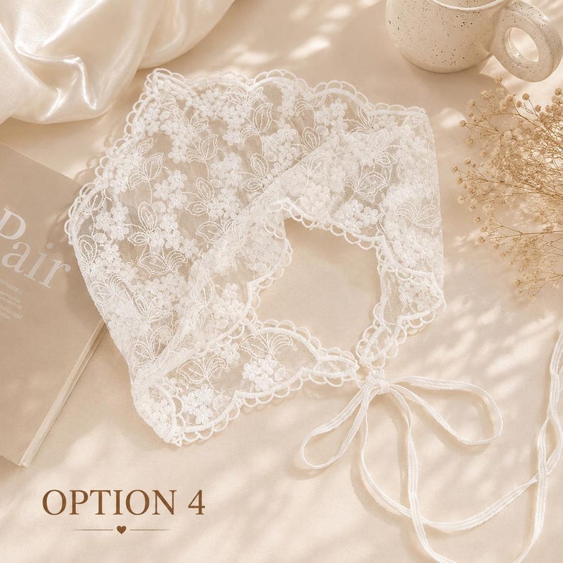 May include: A white lace bonnet with floral patterns and scalloped edges. The bonnet has a tie closure and the text "OPTION 4" at the bottom. The delicate fabric is displayed on a neutral background.